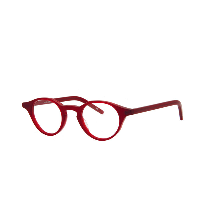 Side view of a pair of round full frame eyeglasses in red color pattern with keyhole bridge and clear lenses.