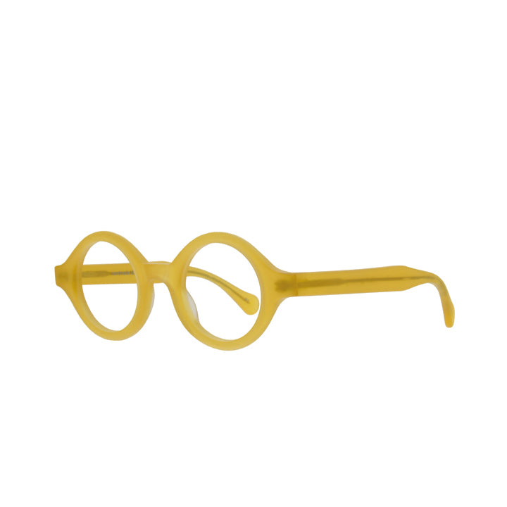 A pair of matte yellow, perfectly round glasses with a saddle bridge and tapered temples.