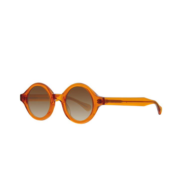 A pair of orange, perfectly round thick sunglasses with a saddle bridge, tapered temples, and gray colored lenses.