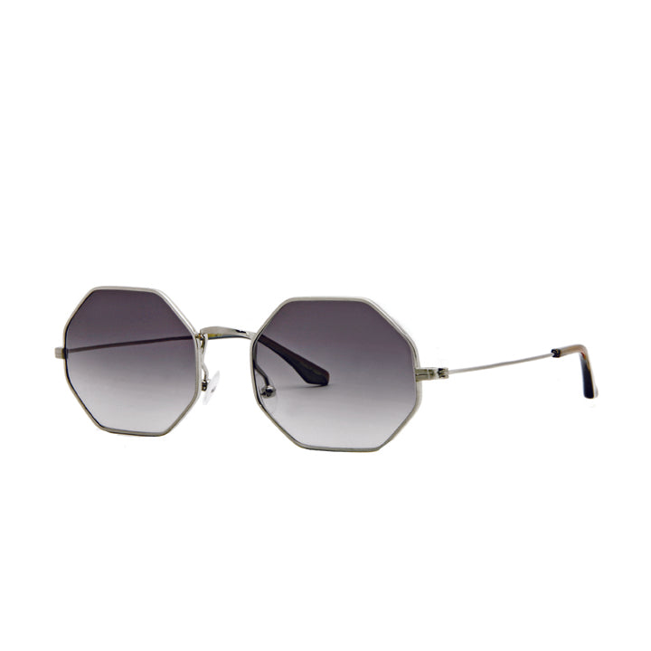 A pair of octagon shaped full frame metal sunglasses in silver color with tortoise accented temples.