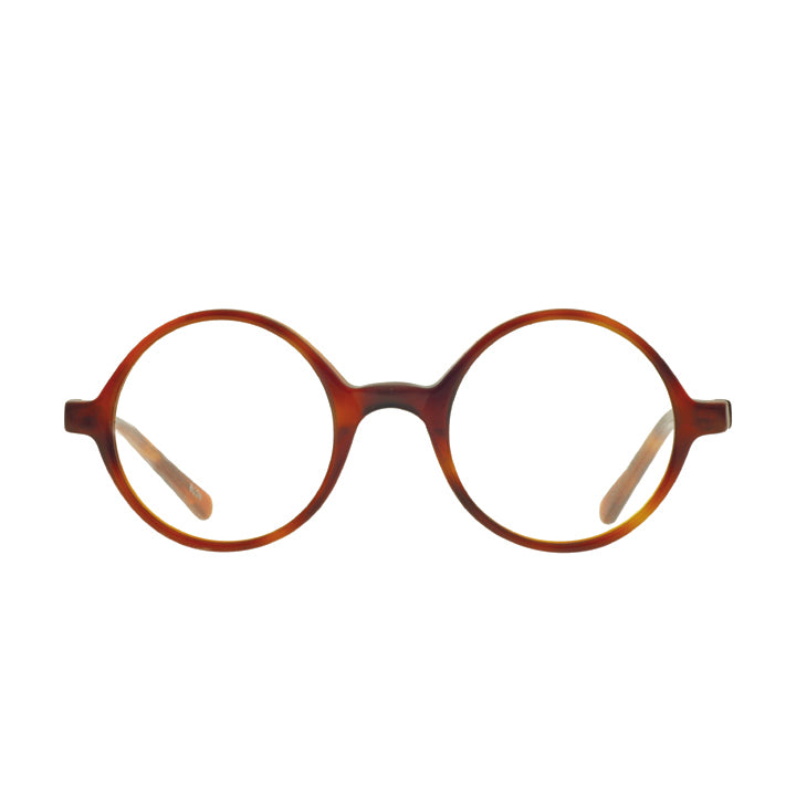 A pair of round eyeglasses made from acetate in a light tortoise/amber color.