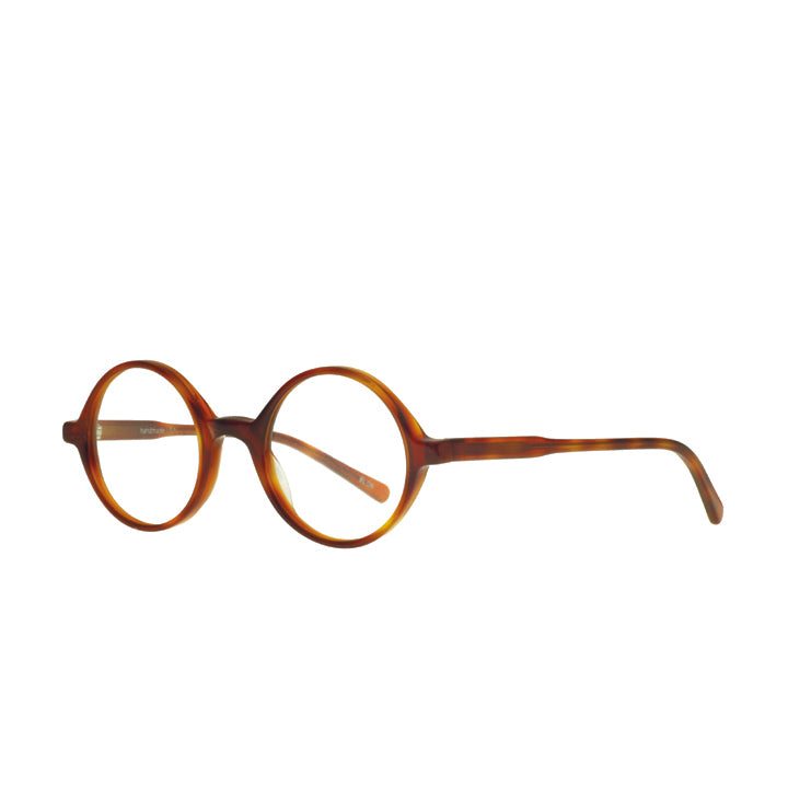 A pair of round eyeglasses made from acetate in a light tortoise/amber color.