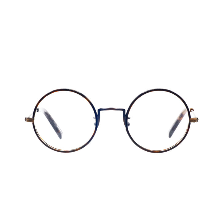 A pair of round full frame metal eyeglasses, copper frame with tortoise accents and temples.