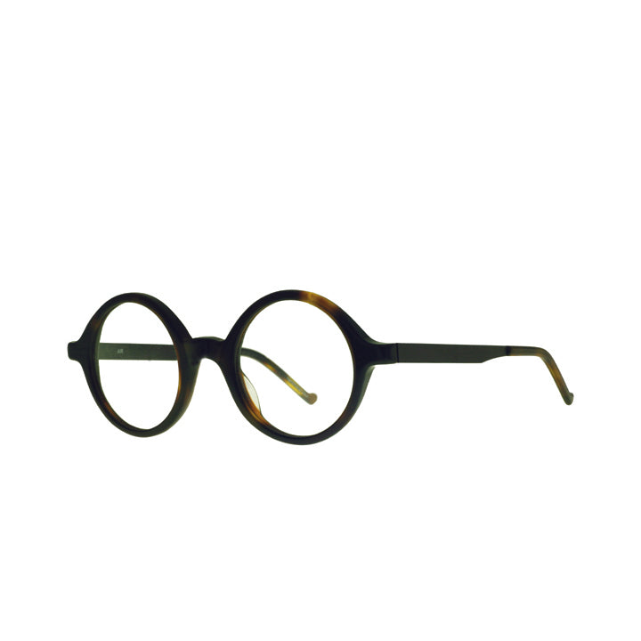 A pair of perfectly round full frame eyeglasses with saddle bridge and clear lenses in tortoise color.
