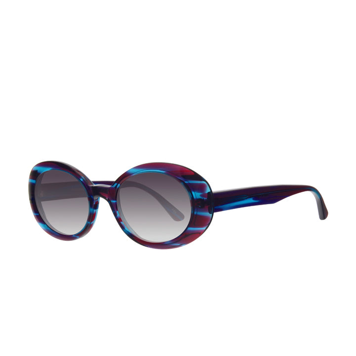 A pair of large rounded sunglasses with saddle bridge, featuring gray lenses in purple and blue streak pattern.