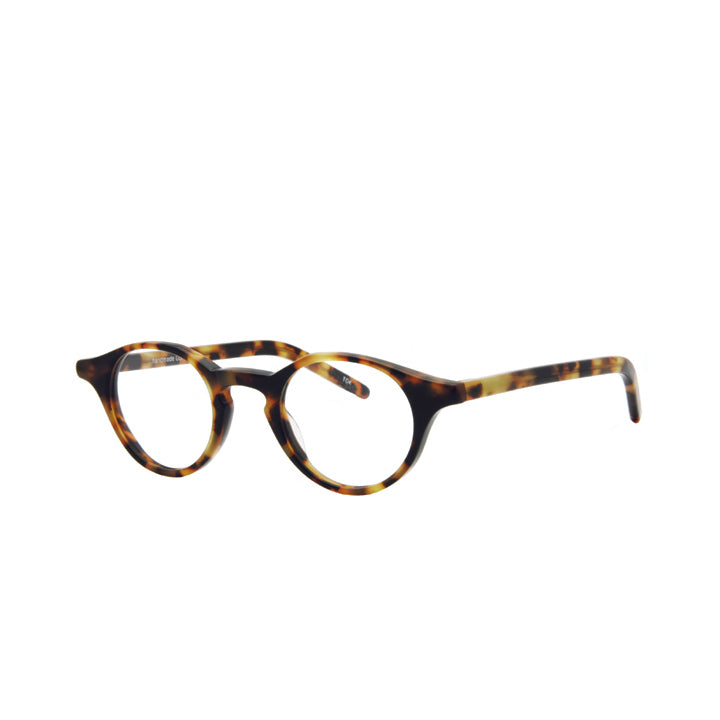 Side view of a pair of round full frame eyeglasses in Tokyo tortoise color pattern with keyhole bridge and clear lenses.