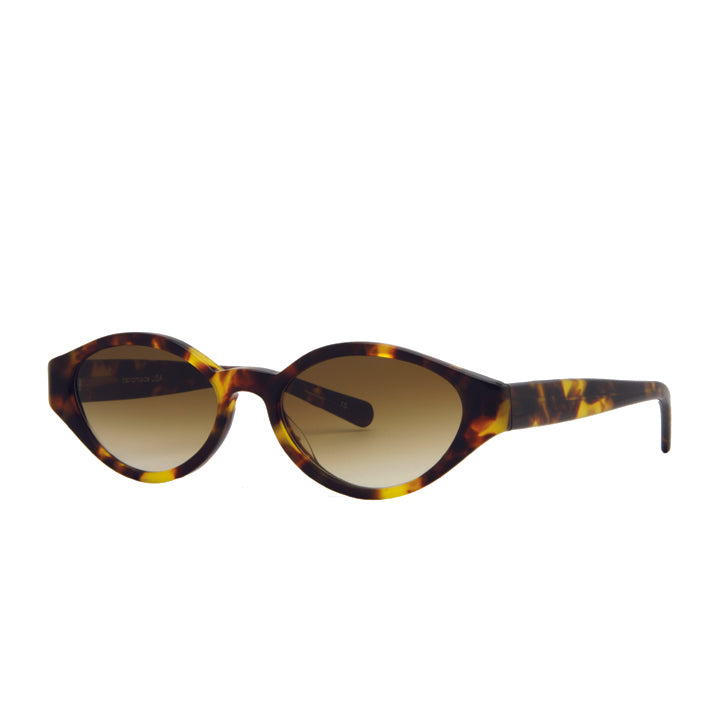 Profile of narrow oval sunglasses in retro 90s style in tortoise shell.